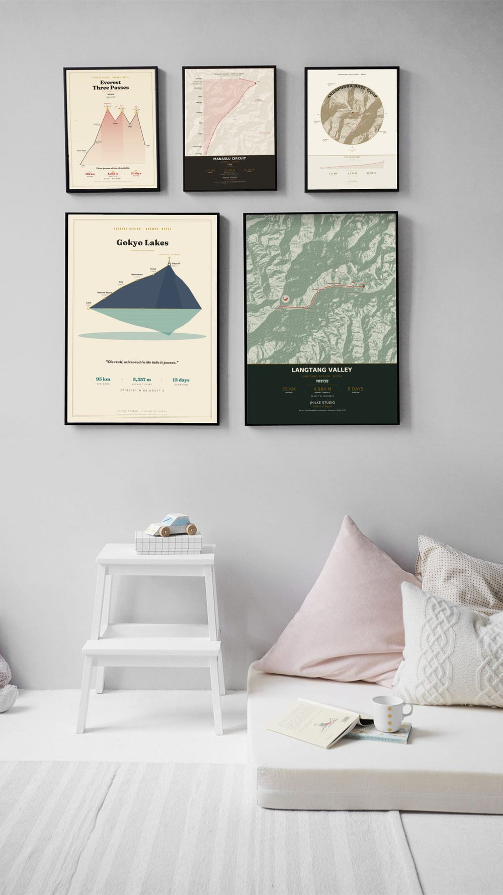 Framed Trek Route Maps prints on a wall