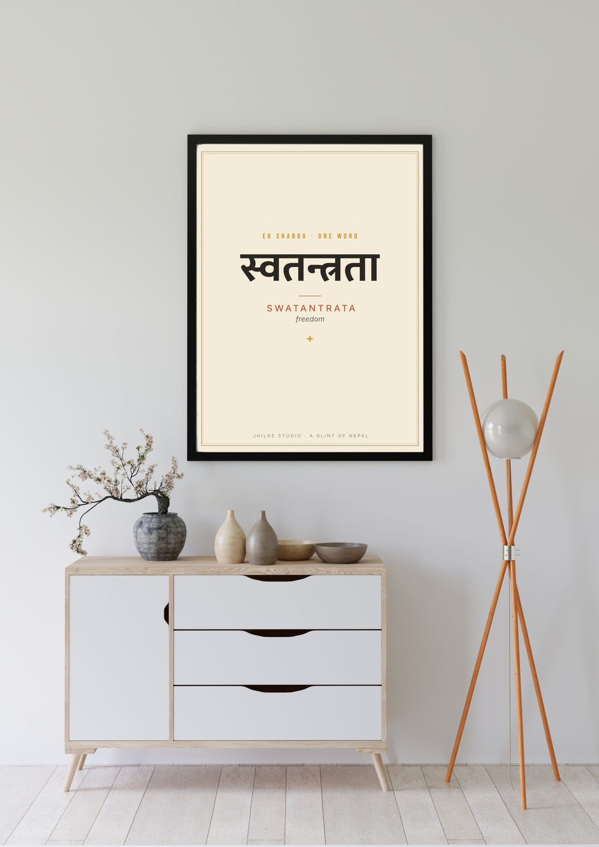 Swatantrata — Sanskrit word print, black frame, above sideboard